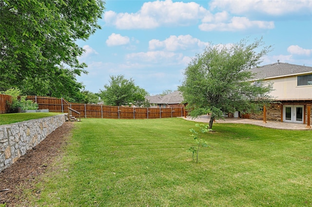 2620 Argyle Shore Dr, Rockwall, TX 75087 - view of yard featuring a fenced backyard, a patio area, and french doors