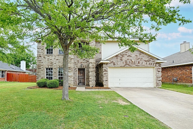 2620 Argyle Shore Dr, Rockwall, TX 75087 - traditional-style home with fence, a front yard, brick siding, an attached garage, and driveway