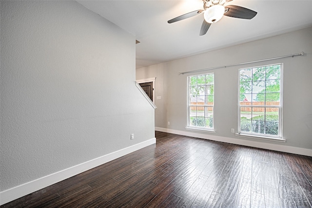 2620 Argyle Shore Dr, Rockwall, TX 75087 - spare room with a ceiling fan, baseboards, a textured wall, and dark wood-type flooring