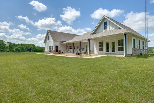 1314 Fleming Rd, Bells, TX 75414 - rear view of property featuring a lawn, board and batten siding, french doors, and a shingled roof
