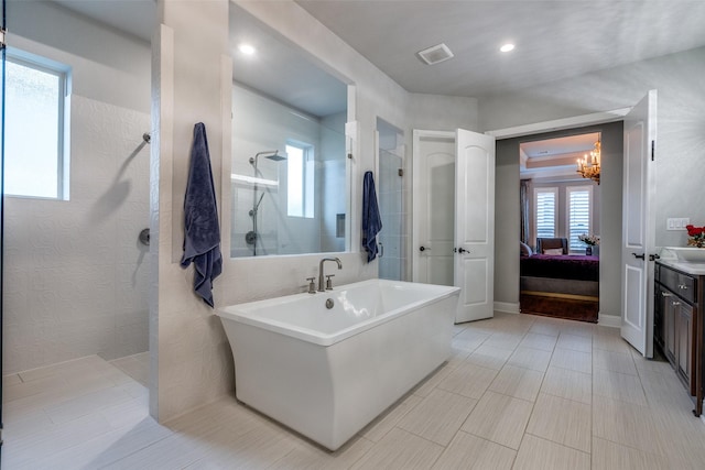 1110 Holford Dr, Frisco, TX 75036 - ensuite bathroom with a walk in shower, an inviting chandelier, vanity, ensuite bathroom, and visible vents