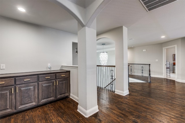 1110 Holford Dr, Frisco, TX 75036 - bar with visible vents, wood finished floors, baseboards, recessed lighting, and arched walkways