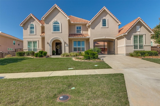 1110 Holford Dr, Frisco, TX 75036 - mediterranean / spanish-style home with a front yard, stucco siding, a tile roof, and fence