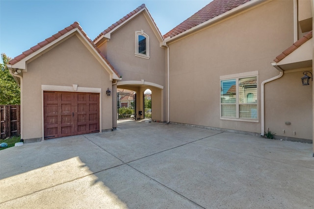 1110 Holford Dr, Frisco, TX 75036 - view of front of property featuring driveway, stucco siding, a garage, and fence