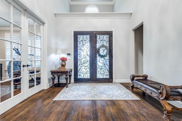 1110 Holford Dr, Frisco, TX 75036 - entrance foyer featuring baseboards, french doors, and wood finished floors