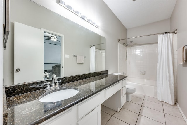 full bathroom featuring vanity, toilet, tile patterned floors, a ceiling fan, and shower / tub combo