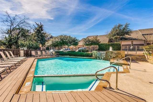 community pool featuring a deck
