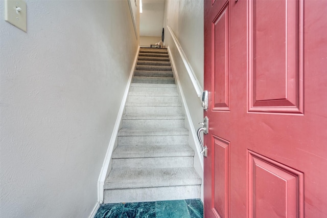 stairway with baseboards