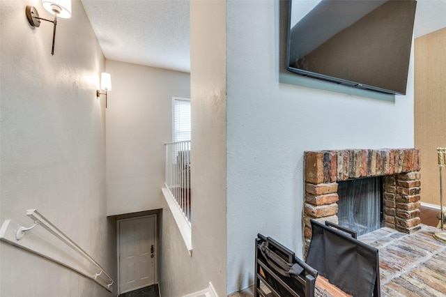 room details with a brick fireplace and baseboards