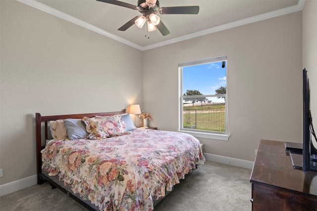 bedroom with carpet flooring, baseboards, and ornamental molding