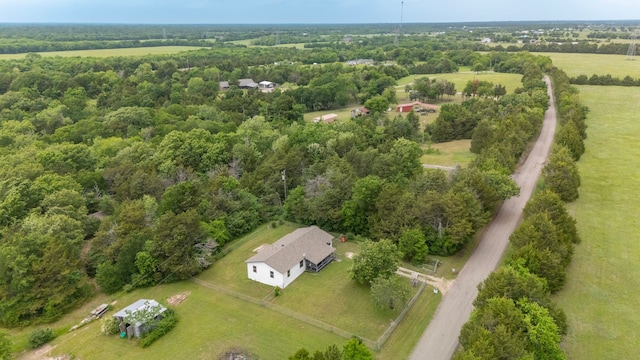 aerial view featuring a rural view and a forest view