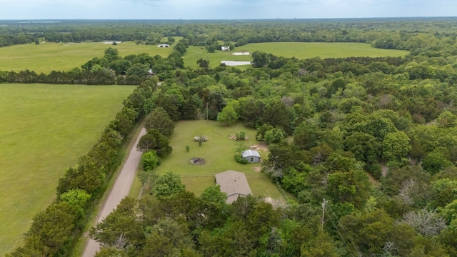 birds eye view of property with a rural view