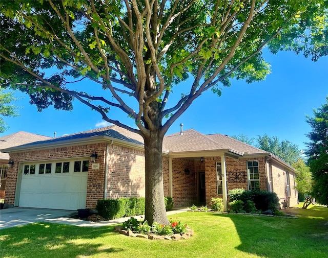 1124 Burnswick Isles Way, Frisco, TX 75036 - ranch-style house featuring an attached garage, a front yard, brick siding, and concrete driveway