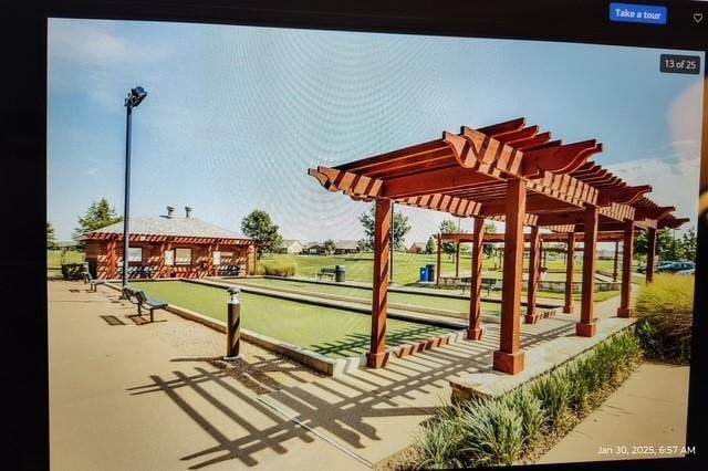 1124 Burnswick Isles Way, Frisco, TX 75036 - view of community with a bocce ball area and a pergola