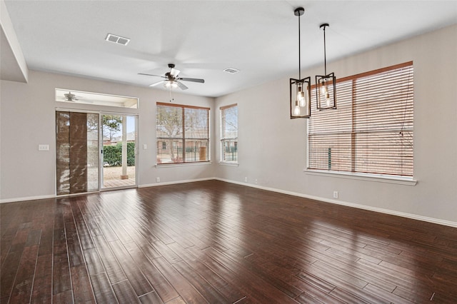 1124 Burnswick Isles Way, Frisco, TX 75036 - unfurnished living room with a ceiling fan, dark wood-type flooring, and baseboards