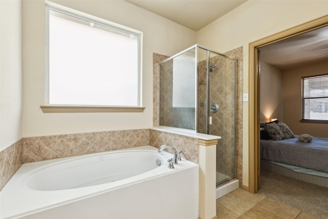 1925 Bridgeport Dr, Providence Village, TX 76227 - bathroom with a garden tub, connected bathroom, tile patterned flooring, and a shower stall