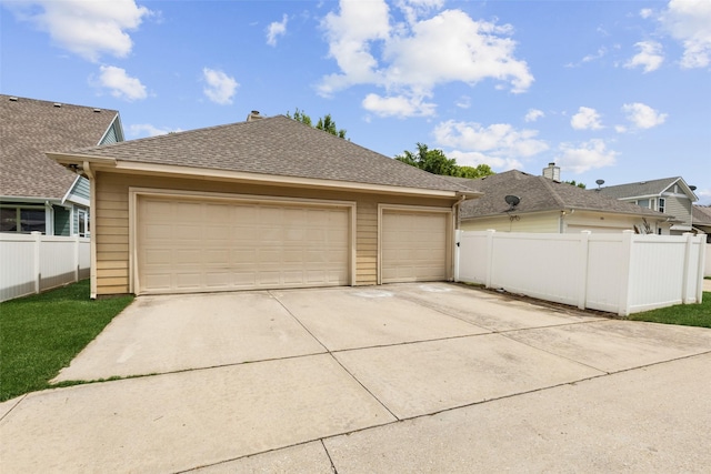 1925 Bridgeport Dr, Providence Village, TX 76227 - garage with fence and driveway