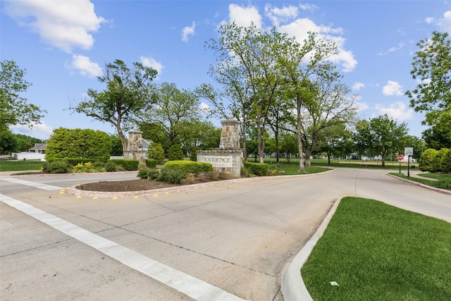 1925 Bridgeport Dr, Providence Village, TX 76227 - view of street featuring traffic signs and curbs