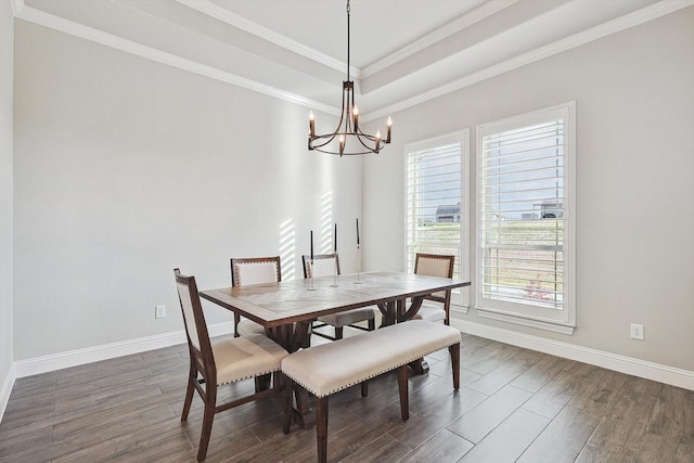 dining space featuring baseboards, dark wood-style floors, and a notable chandelier