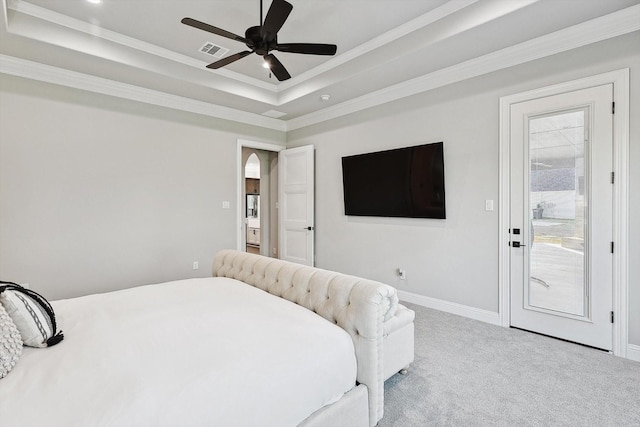 bedroom featuring crown molding, a raised ceiling, access to exterior, carpet, and visible vents