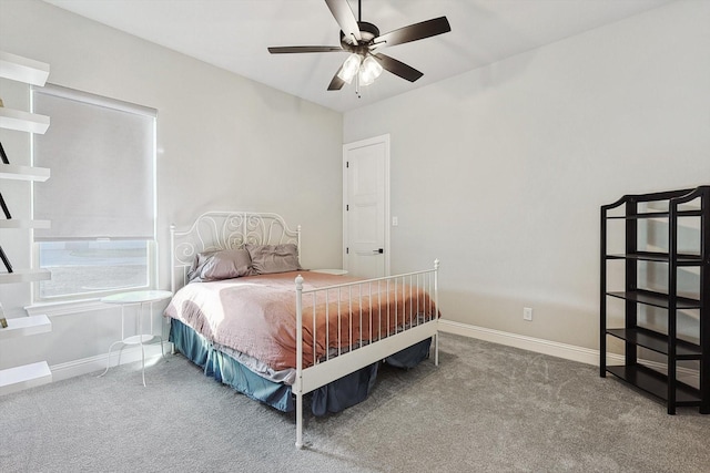 bedroom with carpet floors, baseboards, and ceiling fan