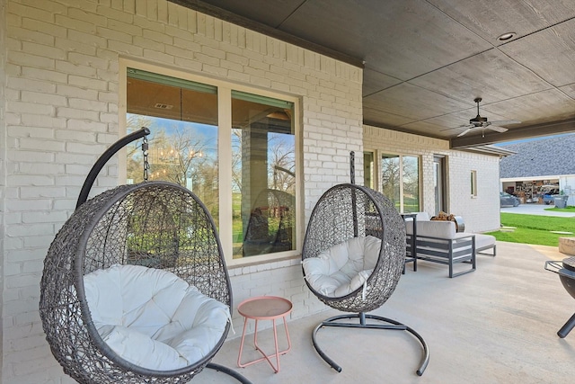 view of patio with ceiling fan and covered porch