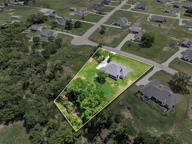317 Wayward Spur, Springtown, TX 76082 - aerial view of property's location featuring property boundaries highlighted and nearby suburban area