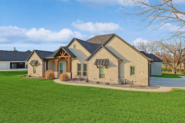 craftsman-style house with a front lawn and stone siding