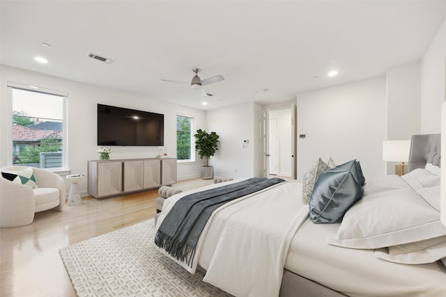 bedroom with visible vents, recessed lighting, ceiling fan, and light wood-type flooring