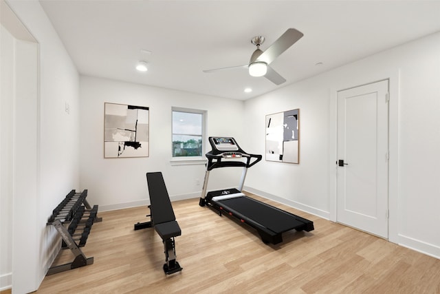 workout room with recessed lighting, baseboards, ceiling fan, and light wood-type flooring