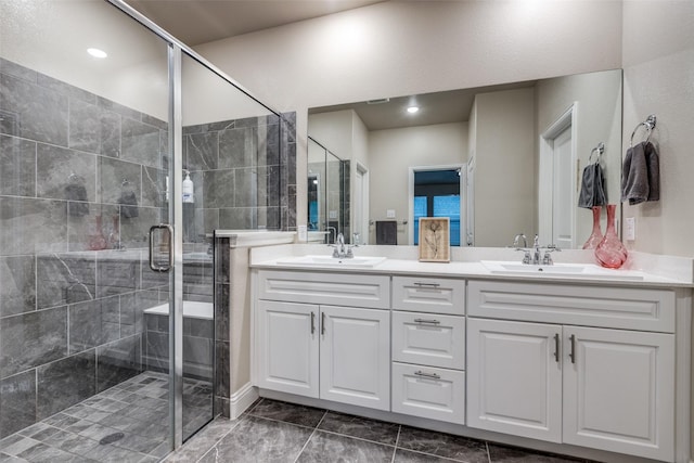 439 Tommie Lillian Ln, Celina, TX 75009 - bathroom featuring a sink, double vanity, and a stall shower
