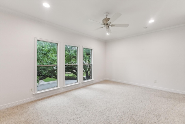 empty room featuring crown molding, recessed lighting, and baseboards