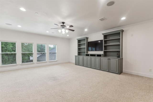 unfurnished living room with baseboards, ceiling fan, light carpet, and visible vents