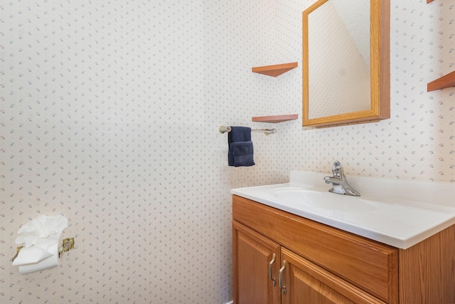 7208 Stoddard Ln, Plano, TX 75025 - bathroom with wallpapered walls and vanity