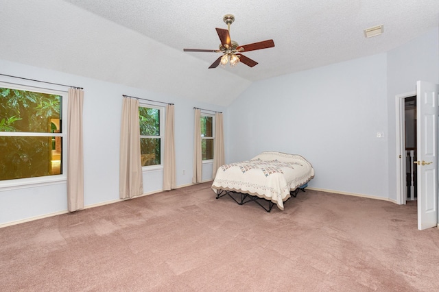 7208 Stoddard Ln, Plano, TX 75025 - bedroom featuring a ceiling fan, visible vents, vaulted ceiling, baseboards, and carpet flooring