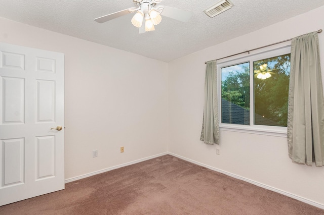 7208 Stoddard Ln, Plano, TX 75025 - carpeted spare room featuring a textured ceiling, ceiling fan, visible vents, and baseboards