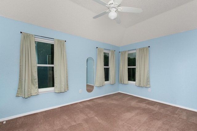 7208 Stoddard Ln, Plano, TX 75025 - carpeted empty room with baseboards, a ceiling fan, and lofted ceiling
