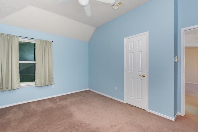 7208 Stoddard Ln, Plano, TX 75025 - unfurnished bedroom featuring carpet flooring, baseboards, visible vents, and lofted ceiling