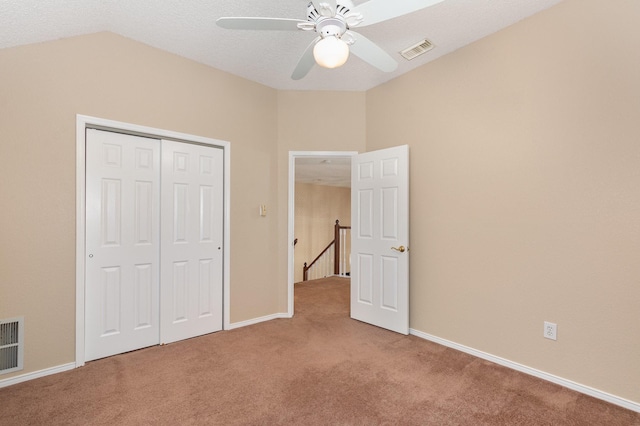 7208 Stoddard Ln, Plano, TX 75025 - unfurnished bedroom featuring visible vents, vaulted ceiling, carpet floors, baseboards, and a closet
