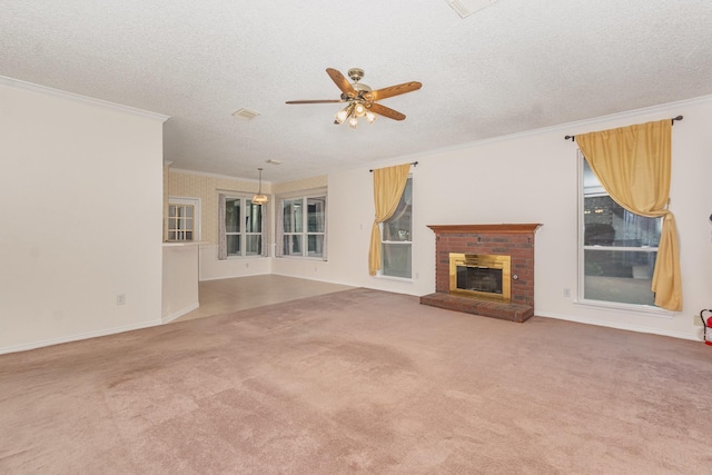 7208 Stoddard Ln, Plano, TX 75025 - unfurnished living room with crown molding, a ceiling fan, a textured ceiling, and carpet