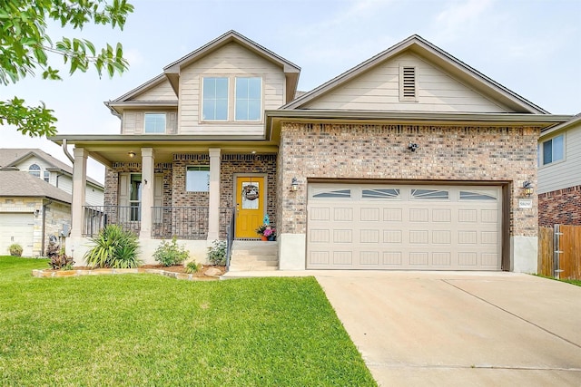 craftsman house with brick siding, a garage, a front yard, concrete driveway, and covered porch