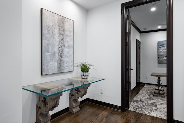 corridor featuring baseboards, recessed lighting, and dark wood-style floors