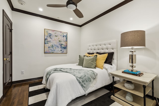 bedroom with a ceiling fan, crown molding, wood finished floors, baseboards, and recessed lighting