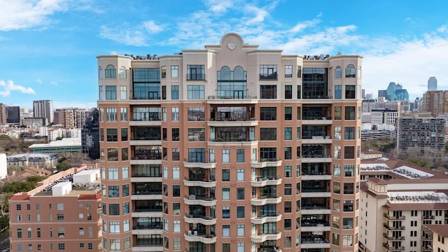 view of building exterior featuring a city view