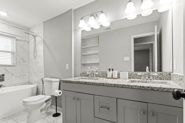 bathroom featuring double vanity, toilet, a sink, and marble finish floor