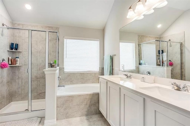 2704 Dancing Flame Dr, Denton, TX 76201 - full bath featuring lofted ceiling, a shower stall, a garden tub, double vanity, and recessed lighting