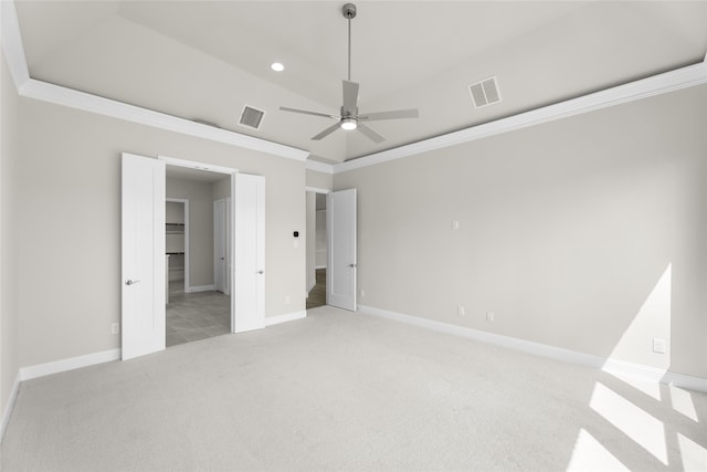 4524 Sky Harbor Dr, Rockwall, TX 75087 - unfurnished bedroom with visible vents, ornamental molding, a walk in closet, and light carpet