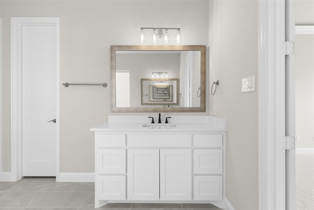 4524 Sky Harbor Dr, Rockwall, TX 75087 - bathroom with baseboards, tile patterned flooring, and vanity