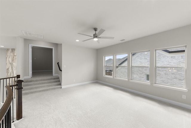 4524 Sky Harbor Dr, Rockwall, TX 75087 - unfurnished room featuring light colored carpet, a ceiling fan, visible vents, and baseboards
