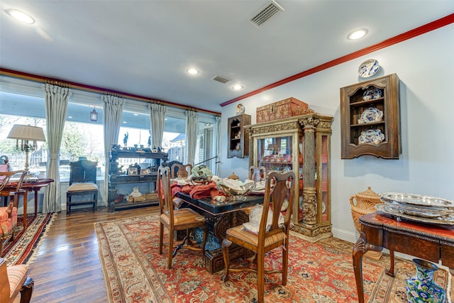 dining space featuring ornamental molding, recessed lighting, and visible vents